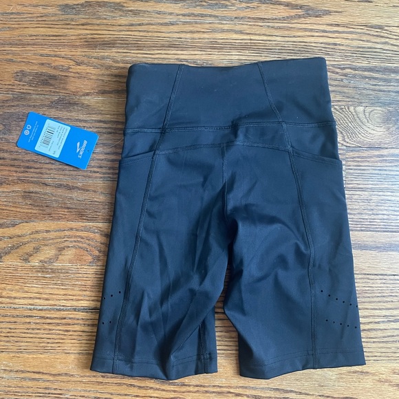 XS brooks 8 inch running shorts. Never worn. Tags still on. - Picture 2 of 4